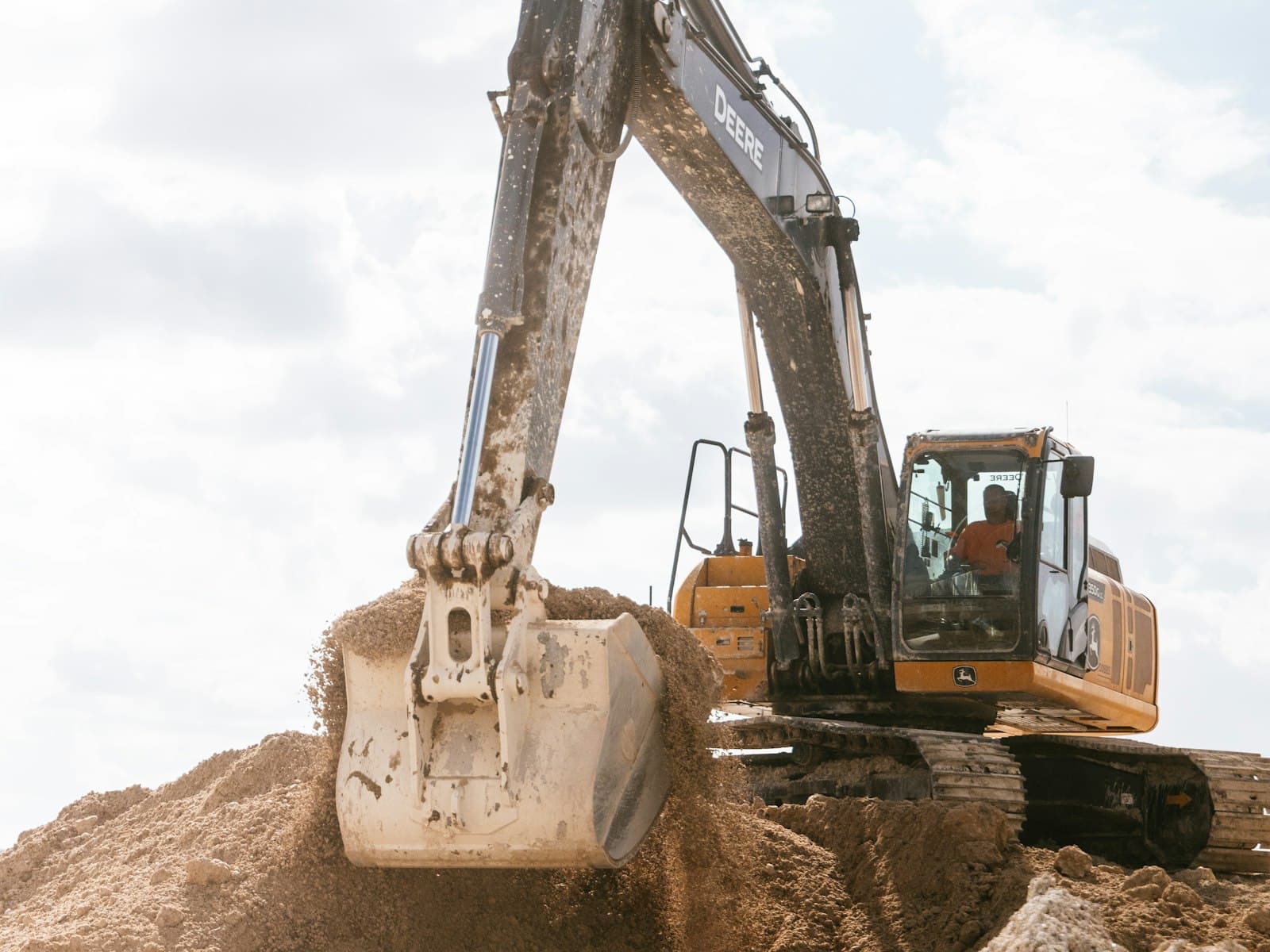 Excavator digging on a job site